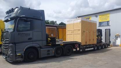 Out-of-gauge cargo on a specialized transport vehicle for import and export services