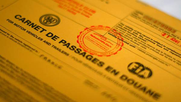 Close-up of a Carnet de Passages document, essential for temporary vehicle imports and exports.